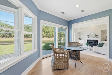 Enjoy panoramic golf course and lagoon views from this beautiful on The Landings Club - Oakridge in Georgia - for sale on GolfHomes.com, golf home, golf lot