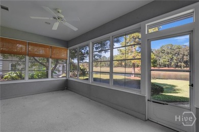 Enjoy panoramic golf course and lagoon views from this beautiful on The Landings Club - Oakridge in Georgia - for sale on GolfHomes.com, golf home, golf lot