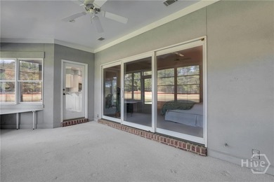 Enjoy panoramic golf course and lagoon views from this beautiful on The Landings Club - Oakridge in Georgia - for sale on GolfHomes.com, golf home, golf lot