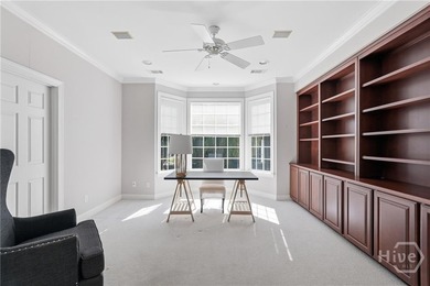 Enjoy panoramic golf course and lagoon views from this beautiful on The Landings Club - Oakridge in Georgia - for sale on GolfHomes.com, golf home, golf lot
