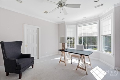 Enjoy panoramic golf course and lagoon views from this beautiful on The Landings Club - Oakridge in Georgia - for sale on GolfHomes.com, golf home, golf lot
