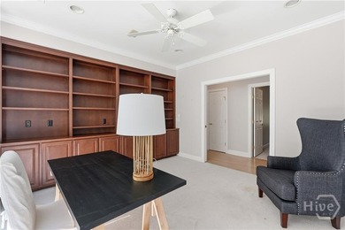 Enjoy panoramic golf course and lagoon views from this beautiful on The Landings Club - Oakridge in Georgia - for sale on GolfHomes.com, golf home, golf lot