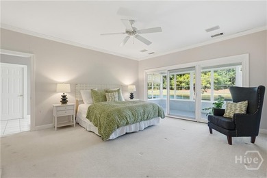 Enjoy panoramic golf course and lagoon views from this beautiful on The Landings Club - Oakridge in Georgia - for sale on GolfHomes.com, golf home, golf lot