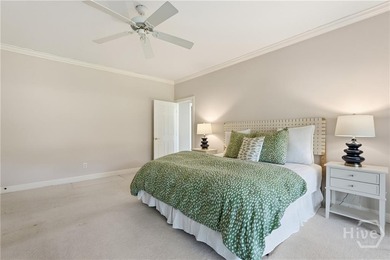 Enjoy panoramic golf course and lagoon views from this beautiful on The Landings Club - Oakridge in Georgia - for sale on GolfHomes.com, golf home, golf lot
