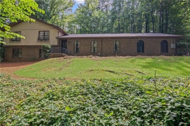 Welcome to 5639 Stillwater Court--Your Private Retreat in the on Smoke Rise Golf and Country Club in Georgia - for sale on GolfHomes.com, golf home, golf lot