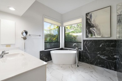 Discover the perfect blend of privacy, luxury, and nature in on Harbour Ridge Yacht and Country Club in Florida - for sale on GolfHomes.com, golf home, golf lot