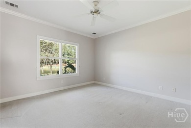 Enjoy panoramic golf course and lagoon views from this beautiful on The Landings Club - Oakridge in Georgia - for sale on GolfHomes.com, golf home, golf lot