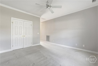 Enjoy panoramic golf course and lagoon views from this beautiful on The Landings Club - Oakridge in Georgia - for sale on GolfHomes.com, golf home, golf lot