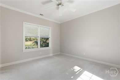 Enjoy panoramic golf course and lagoon views from this beautiful on The Landings Club - Oakridge in Georgia - for sale on GolfHomes.com, golf home, golf lot