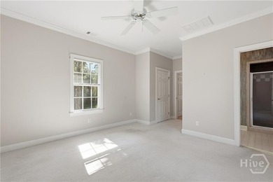 Enjoy panoramic golf course and lagoon views from this beautiful on The Landings Club - Oakridge in Georgia - for sale on GolfHomes.com, golf home, golf lot