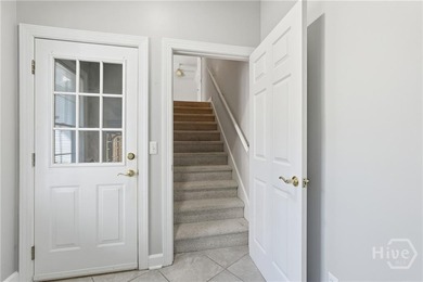 Enjoy panoramic golf course and lagoon views from this beautiful on The Landings Club - Oakridge in Georgia - for sale on GolfHomes.com, golf home, golf lot
