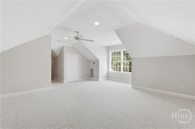 Enjoy panoramic golf course and lagoon views from this beautiful on The Landings Club - Oakridge in Georgia - for sale on GolfHomes.com, golf home, golf lot