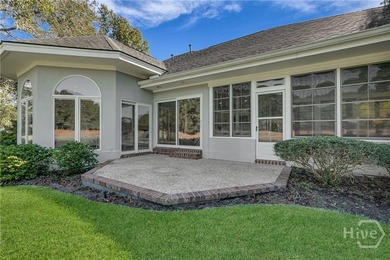 Enjoy panoramic golf course and lagoon views from this beautiful on The Landings Club - Oakridge in Georgia - for sale on GolfHomes.com, golf home, golf lot