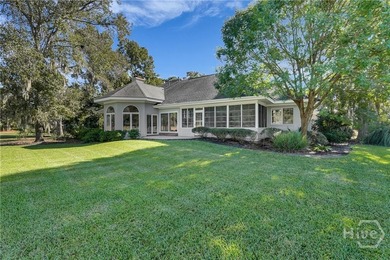 Enjoy panoramic golf course and lagoon views from this beautiful on The Landings Club - Oakridge in Georgia - for sale on GolfHomes.com, golf home, golf lot