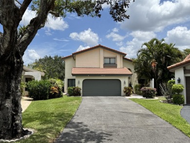 A rare find! 4 bedroom 2.5 bathroom multi-generational living on Indian Spring Golf and Country Club in Florida - for sale on GolfHomes.com, golf home, golf lot