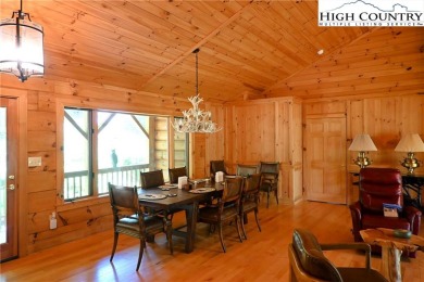 Custom built Rustic Log Home on a quiet wooded lot.  Enjoy this on Mountain Aire Golf Course in North Carolina - for sale on GolfHomes.com, golf home, golf lot