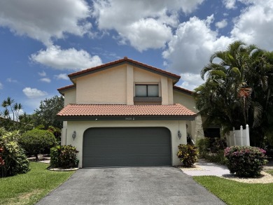 A rare find! 4 bedroom 2.5 bathroom multi-generational living on Indian Spring Golf and Country Club in Florida - for sale on GolfHomes.com, golf home, golf lot