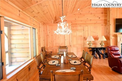 Custom built Rustic Log Home on a quiet wooded lot.  Enjoy this on Mountain Aire Golf Course in North Carolina - for sale on GolfHomes.com, golf home, golf lot