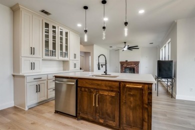 Located in the Woodbridge community in Sachse, this 4-bedroom, 2 on Woodbridge Golf Club in Texas - for sale on GolfHomes.com, golf home, golf lot