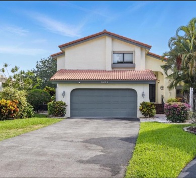 A rare find! 4 bedroom 2.5 bathroom multi-generational living on Indian Spring Golf and Country Club in Florida - for sale on GolfHomes.com, golf home, golf lot