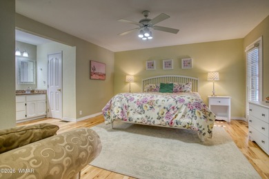 Set among towering pines on a private 0.31-acre corner lot, this on Pinetop Lakes Golf and Country Club in Arizona - for sale on GolfHomes.com, golf home, golf lot