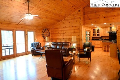 Custom built Rustic Log Home on a quiet wooded lot.  Enjoy this on Mountain Aire Golf Course in North Carolina - for sale on GolfHomes.com, golf home, golf lot