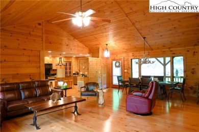 Custom built Rustic Log Home on a quiet wooded lot.  Enjoy this on Mountain Aire Golf Course in North Carolina - for sale on GolfHomes.com, golf home, golf lot