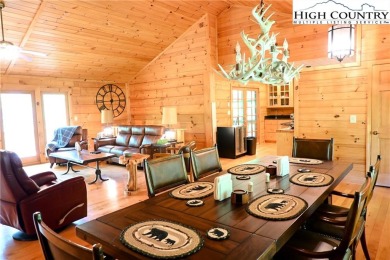 Custom built Rustic Log Home on a quiet wooded lot.  Enjoy this on Mountain Aire Golf Course in North Carolina - for sale on GolfHomes.com, golf home, golf lot