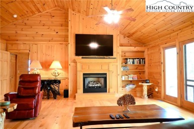 Custom built Rustic Log Home on a quiet wooded lot.  Enjoy this on Mountain Aire Golf Course in North Carolina - for sale on GolfHomes.com, golf home, golf lot