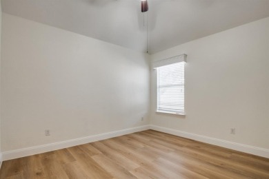 Located in the Woodbridge community in Sachse, this 4-bedroom, 2 on Woodbridge Golf Club in Texas - for sale on GolfHomes.com, golf home, golf lot
