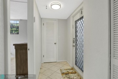 Rare 3BR/2BA corner unit in Deer Creek Country Club with in-unit on Deer Creek Golf Club in Florida - for sale on GolfHomes.com, golf home, golf lot