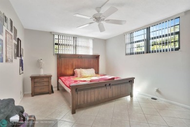 Rare 3BR/2BA corner unit in Deer Creek Country Club with in-unit on Deer Creek Golf Club in Florida - for sale on GolfHomes.com, golf home, golf lot