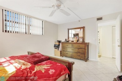 Rare 3BR/2BA corner unit in Deer Creek Country Club with in-unit on Deer Creek Golf Club in Florida - for sale on GolfHomes.com, golf home, golf lot