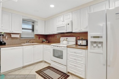Rare 3BR/2BA corner unit in Deer Creek Country Club with in-unit on Deer Creek Golf Club in Florida - for sale on GolfHomes.com, golf home, golf lot