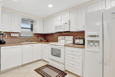 Rare 3BR/2BA corner unit in Deer Creek Country Club with in-unit on  in Florida - for sale on GolfHomes.com, golf home, golf lot