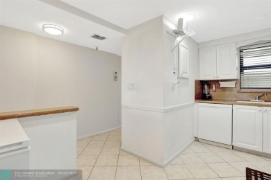 Rare 3BR/2BA corner unit in Deer Creek Country Club with in-unit on Deer Creek Golf Club in Florida - for sale on GolfHomes.com, golf home, golf lot