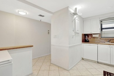 Rare 3BR/2BA corner unit in Deer Creek Country Club with in-unit on  in Florida - for sale on GolfHomes.com, golf home, golf lot