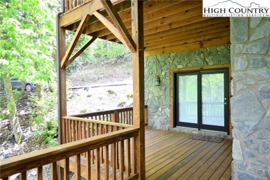 Custom built Rustic Log Home on a quiet wooded lot.  Enjoy this on Mountain Aire Golf Course in North Carolina - for sale on GolfHomes.com, golf home, golf lot