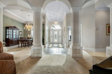 Elegant Lakefront Living in Prestigious Golden Eagle Plantation on Golden Eagle Country Club in Florida - for sale on GolfHomes.com, golf home, golf lot