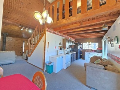 Sugar Valley Lakefront Getaway sits on double lots #79 & #80 on Sugar Valley Lakes Golf Course in Kansas - for sale on GolfHomes.com, golf home, golf lot