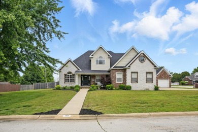 This beautiful home is nestled on a corner lot within the on Briarbrook Golf Course in Missouri - for sale on GolfHomes.com, golf home, golf lot