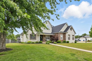 This beautiful home is nestled on a corner lot within the on Briarbrook Golf Course in Missouri - for sale on GolfHomes.com, golf home, golf lot