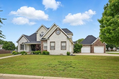 This beautiful home is nestled on a corner lot within the on Briarbrook Golf Course in Missouri - for sale on GolfHomes.com, golf home, golf lot