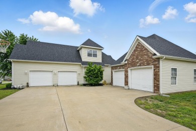 This beautiful home is nestled on a corner lot within the on Briarbrook Golf Course in Missouri - for sale on GolfHomes.com, golf home, golf lot