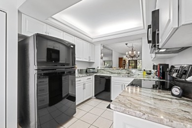 WELL KEPT FIRST FLOOR WITH TRANQUIL GOLF COURSE VIEW IN QUIET on Boca Delray Golf and Country Club in Florida - for sale on GolfHomes.com, golf home, golf lot