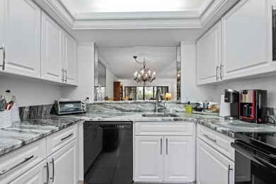 WELL KEPT FIRST FLOOR WITH TRANQUIL GOLF COURSE VIEW IN QUIET on Boca Delray Golf and Country Club in Florida - for sale on GolfHomes.com, golf home, golf lot
