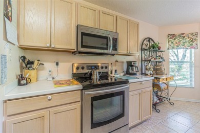 An incredibly priced three bedroom, two bath home in the on Tampa Bay Golf and Country Club in Florida - for sale on GolfHomes.com, golf home, golf lot