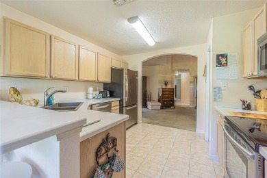 An incredibly priced three bedroom, two bath home in the on Tampa Bay Golf and Country Club in Florida - for sale on GolfHomes.com, golf home, golf lot