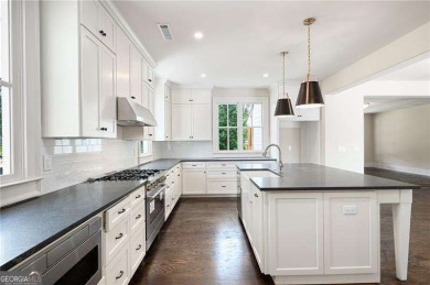 Welcome to this stunning custom-built residence nestled in the on Sunset Hills Country Club in Georgia - for sale on GolfHomes.com, golf home, golf lot