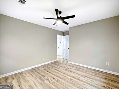 Exceptionally Renovated Four-Sided Brick Ranch On A Quiet Street on East Lake Golf Club in Georgia - for sale on GolfHomes.com, golf home, golf lot